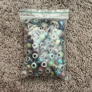 Bag of pandora charms (around 75-100)